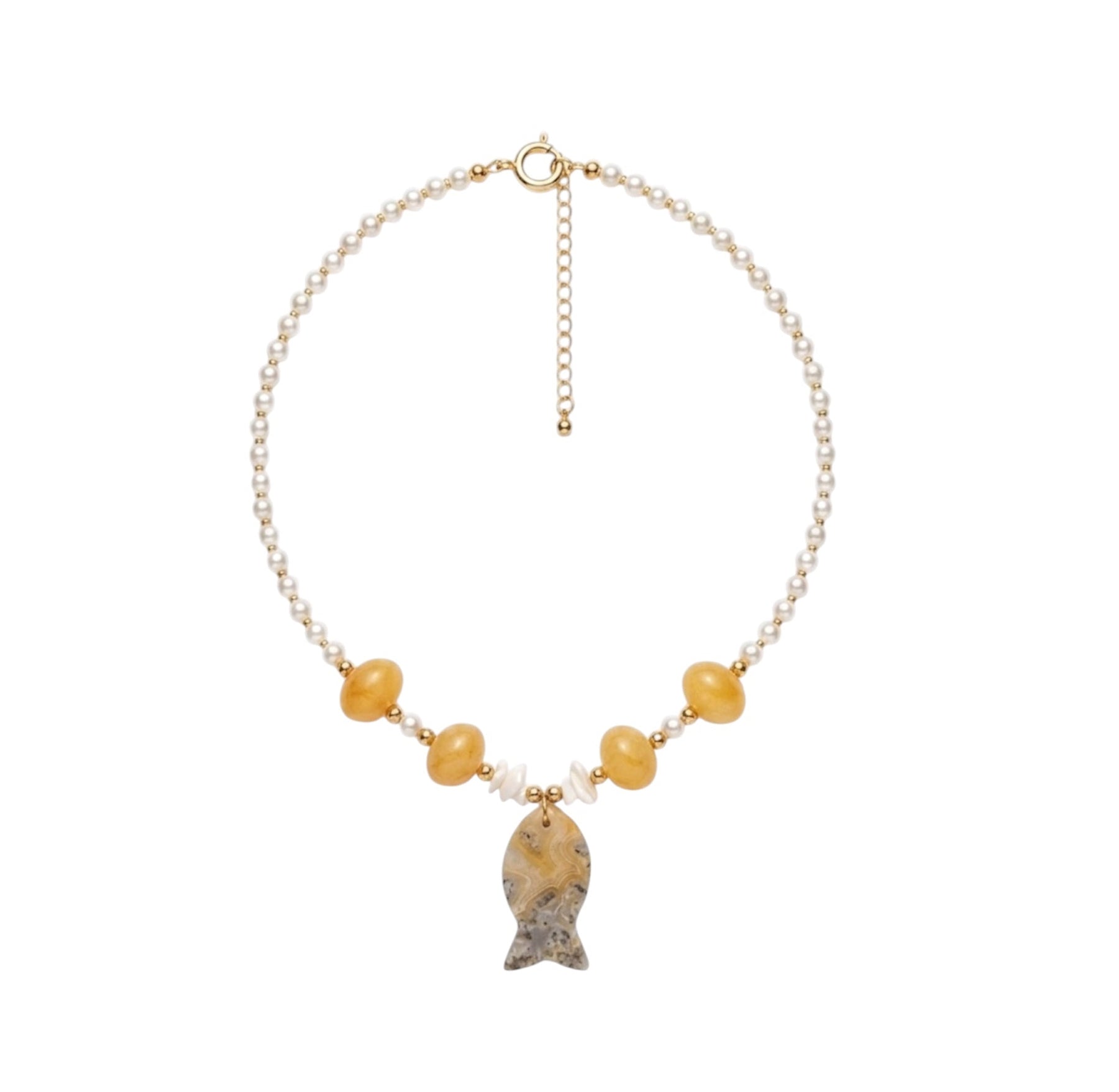A delicate necklace featuring a gold-tone chain, small yellow beads, clear spacer beads, and a central fish-shaped stone pendant with a textured gray and gold pattern, displayed on a solid white background.